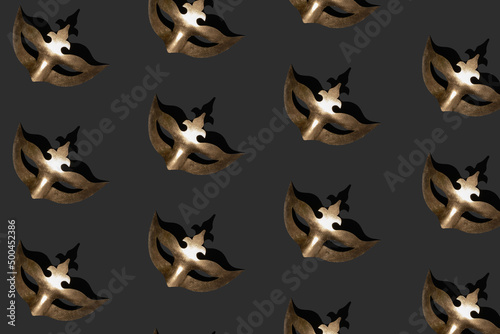 Seamless pattern made of metallic gold masquerade mask on black background. Isometric view. Carnival or Masquerade concept.