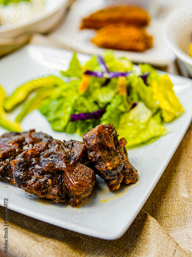 grilled oxtails food flat lay