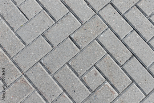 Fotografia Gray cobblestone road pavement texture