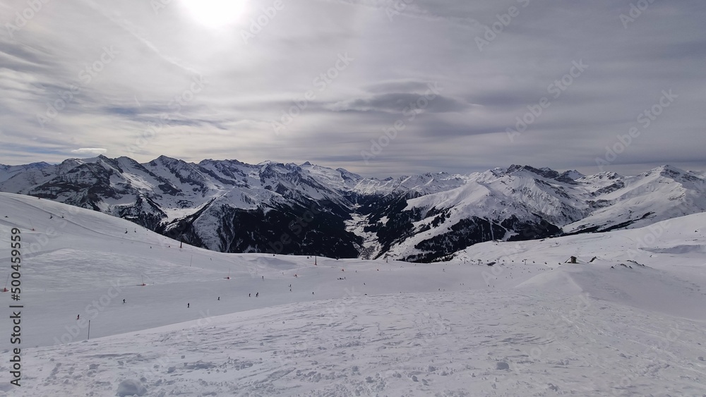 Mayerhoven ski area with snowy mountains from top