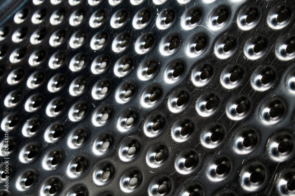 abstract metallic texture with holes