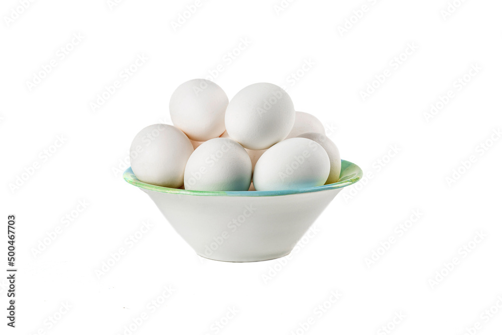 Plate with chicken eggs on a white background.Isolate Plate with chicken eggs on a white background.Isolate