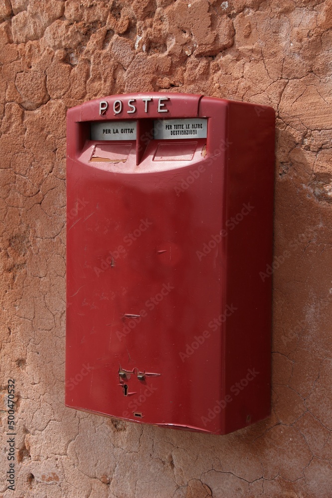 Italy: Old red post box .