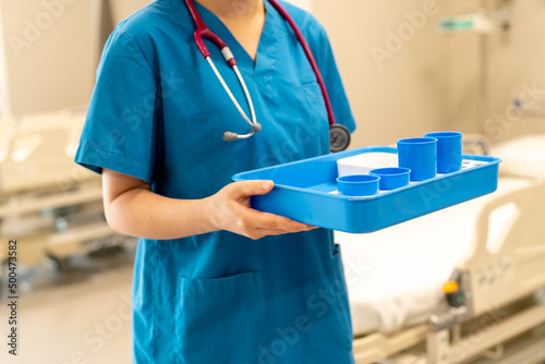 Fotografija nurse deliver medicine for patient in hospital, patient room service