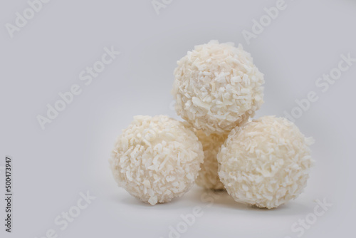 coconut candies on white background