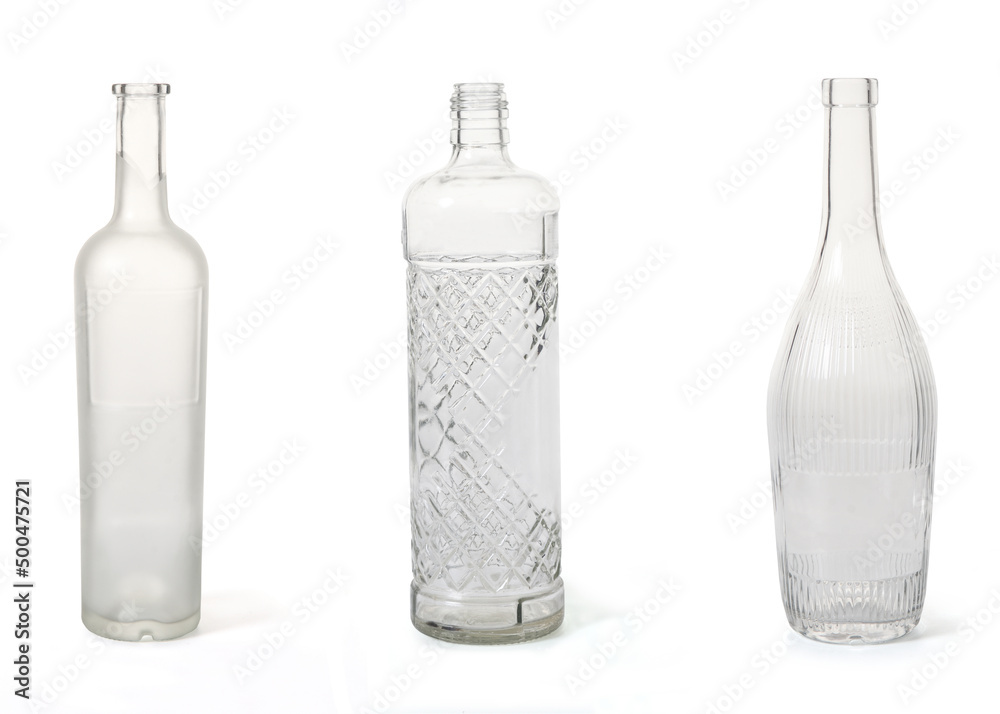 group of opaque and textured bottles on white background