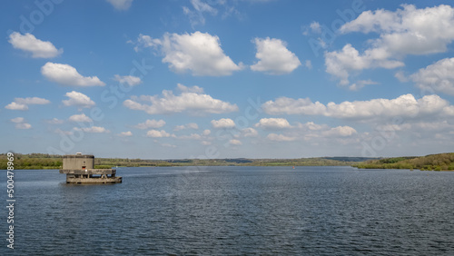 View of Roadford Dam and Reservoir, Lake, Cornwall, England. With Valve Tower. photo