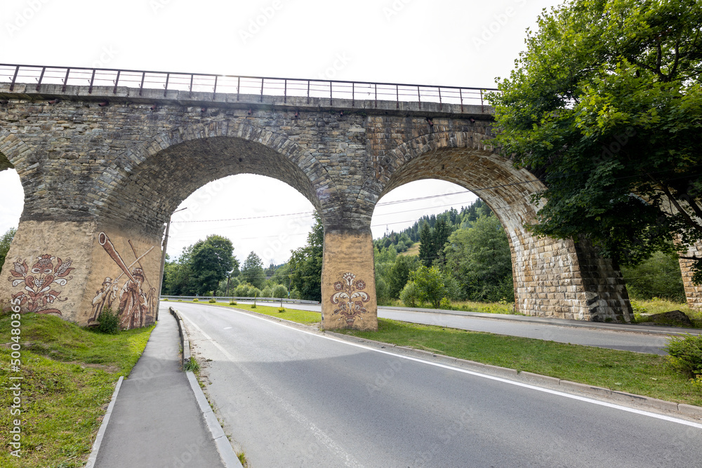 Fototapeta premium Old railway arch bridge. Panorama.