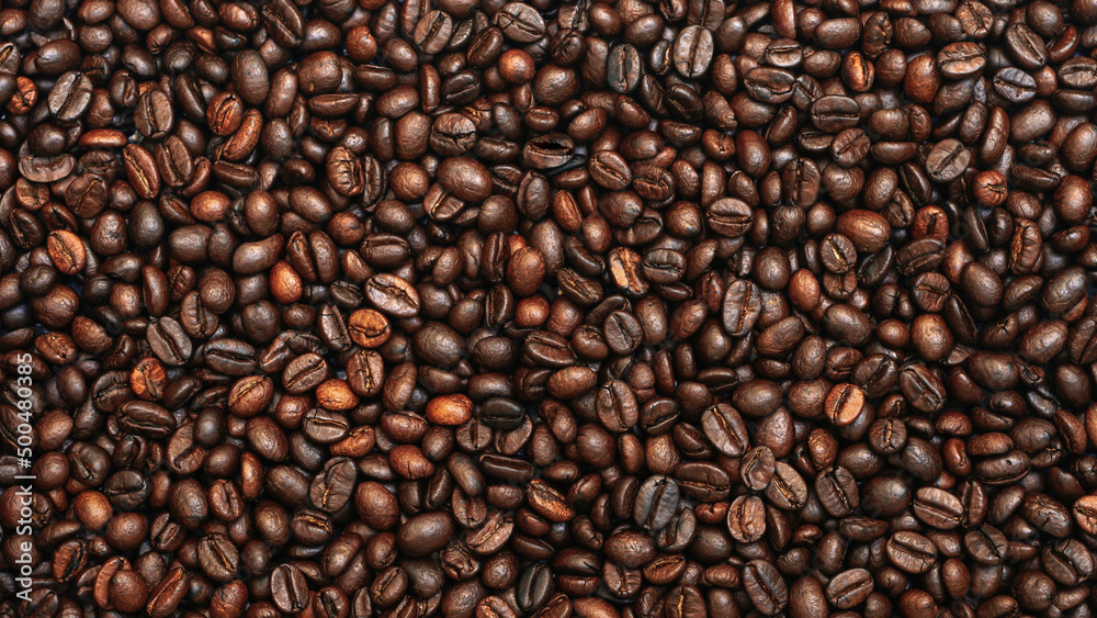 Fototapeta premium background of coffee beans. top view of coffee beans texture. 