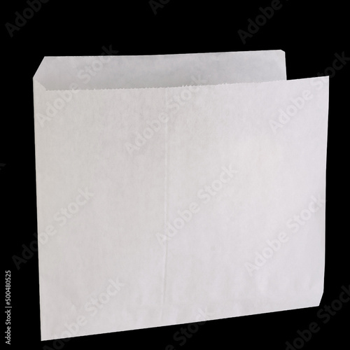 white paper bags on black background