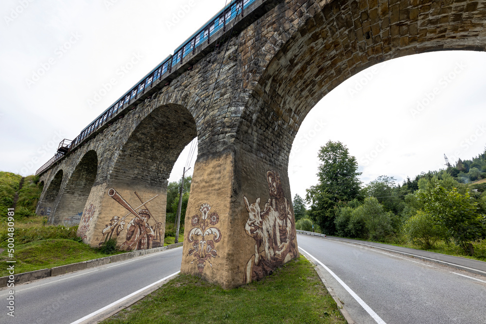Fototapeta premium Old railway arch bridge. Panorama.