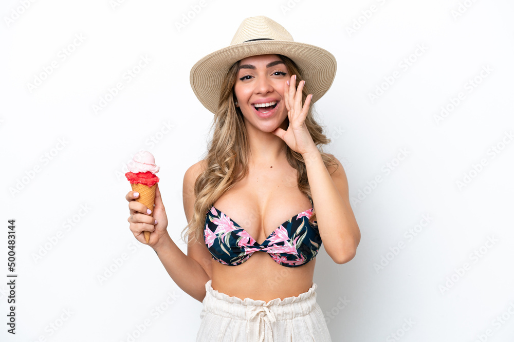 Girl wearing a swimsuit and holding cornet ice cream isolated on white background shouting with mouth wide open Girl wearing a swimsuit and holding cornet ice cream isolated on white background shouting with mouth wide open