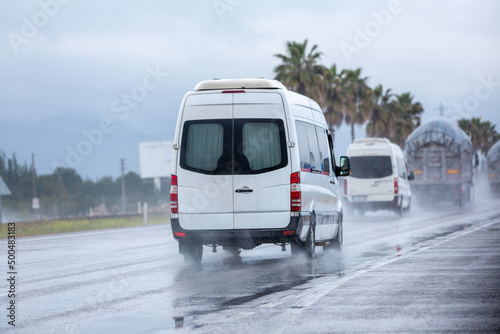 Cars driving along a wet highway in rainy weather in Turkey