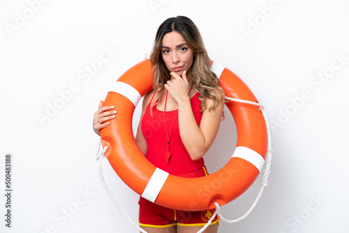 Lifeguard caucasian woman isolated on white background thinking