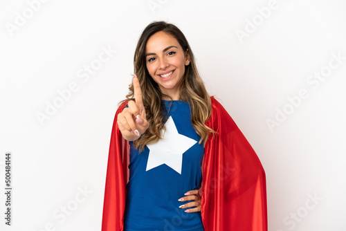 Super Hero woman over isolated white background showing and lifting a finger