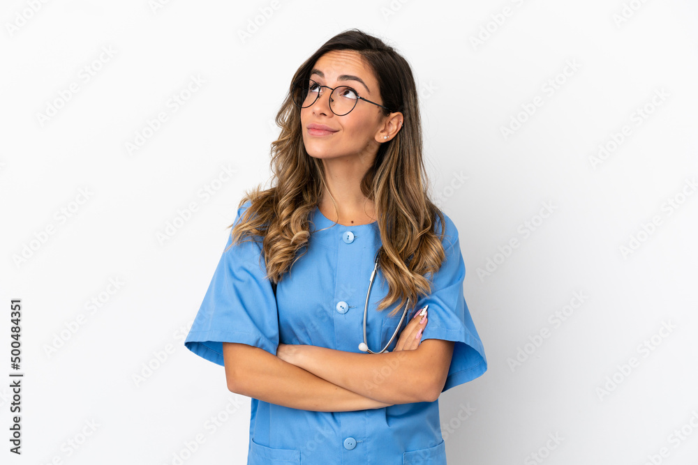 Young surgeon doctor woman over isolated white wall making doubts gesture while lifting the shoulders Young surgeon doctor woman over isolated white wall making doubts gesture while lifting the shoulders