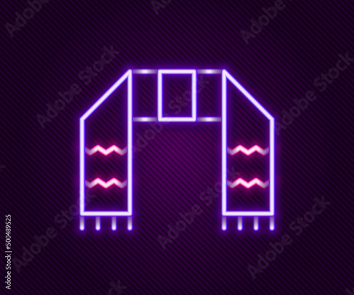 Glowing neon line Winter scarf icon isolated on black background. Colorful outline concept. Vector