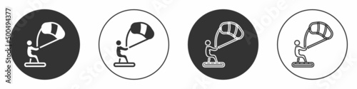 Black Kitesurfing icon isolated on white background. Circle button. Vector