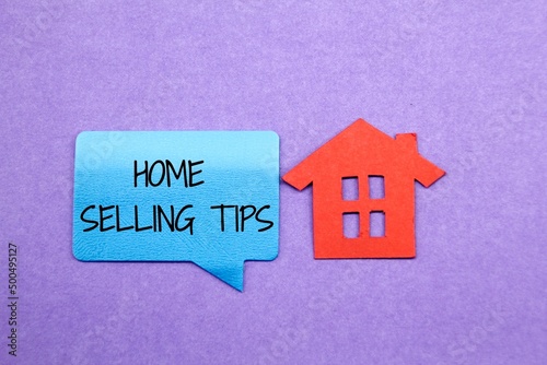 paper houses and conversation boxes with the words Home Selling Tips