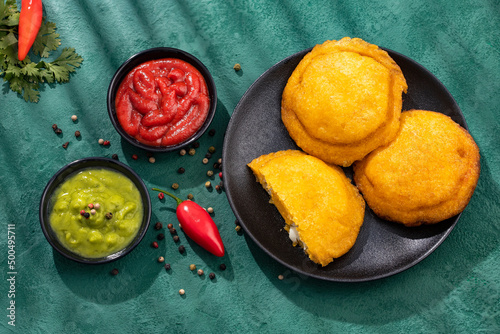 Fried egg arepa - Traditional Colombian food photo