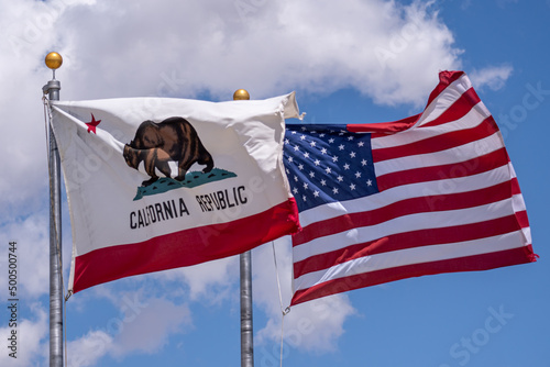California State Flag and USA Flag Blowing in the Wind