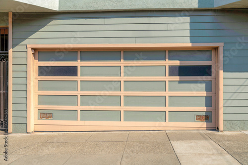 Attached garage exterior with greenish gray tones at San Francisco  California
