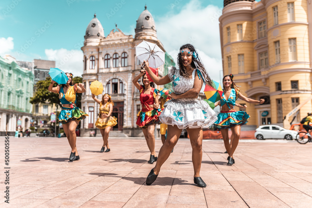 Frevo dancers at the street carnival in Recife, Pernambuco, Brazil. - obrazy, fototapety, plakaty 