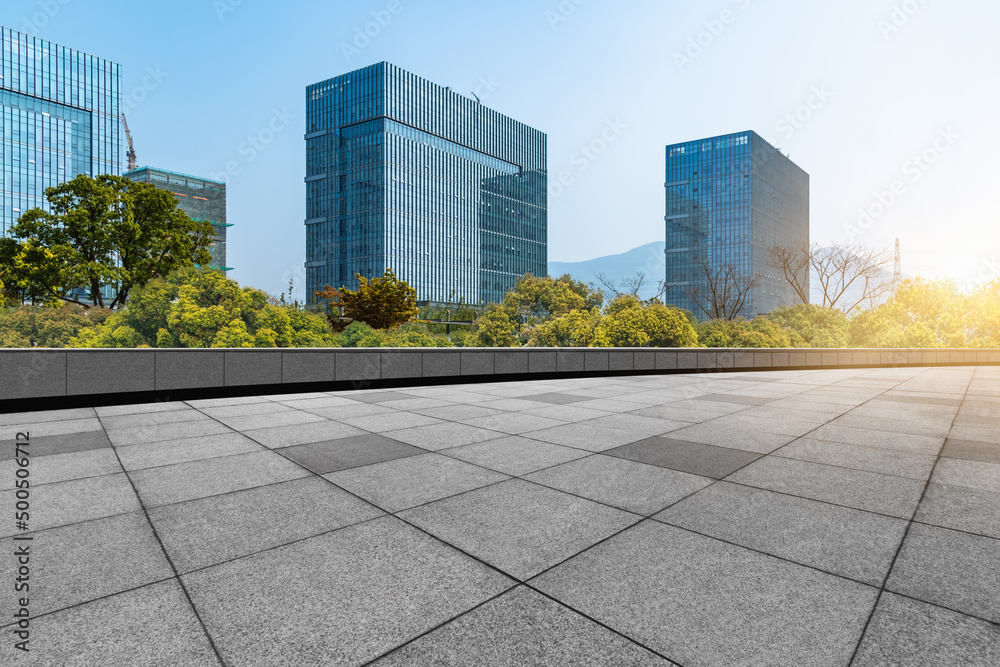 modern buildings and empty pavement in china. modern buildings and empty pavement in china.