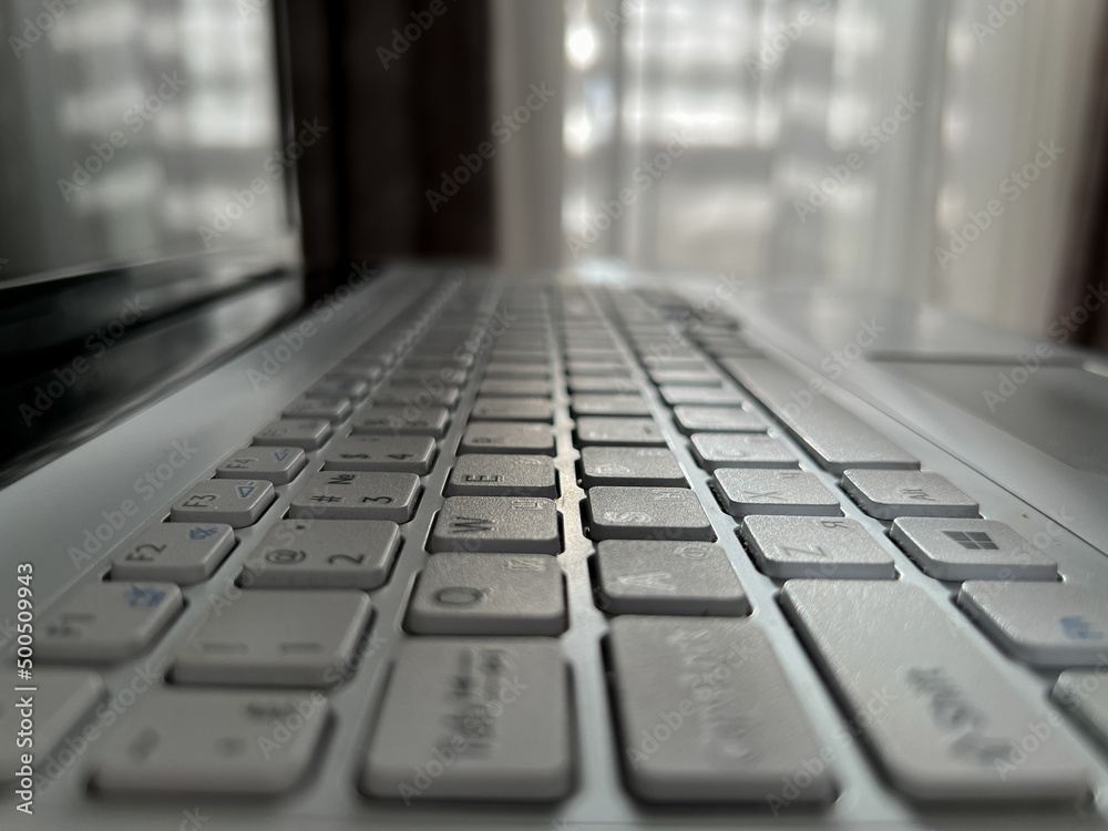 Laptop keyboard close up. High quality photo