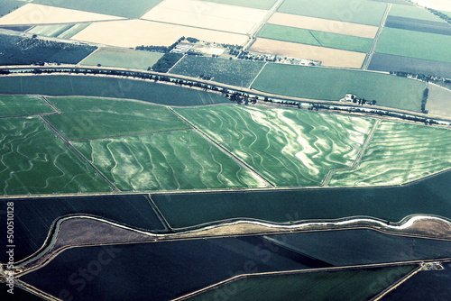Arial view of flooded terraced fields and irrigation ditches near Sacramento California USA