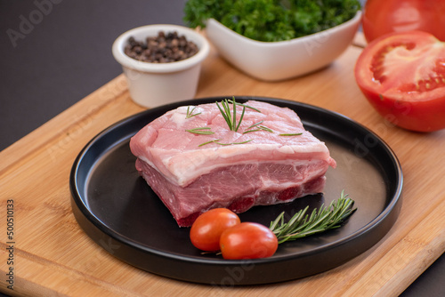 Raw pork with pepper and tomatoes