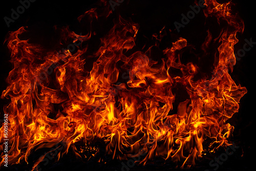 Blaze burning fire flame on art texture background. Fototapet