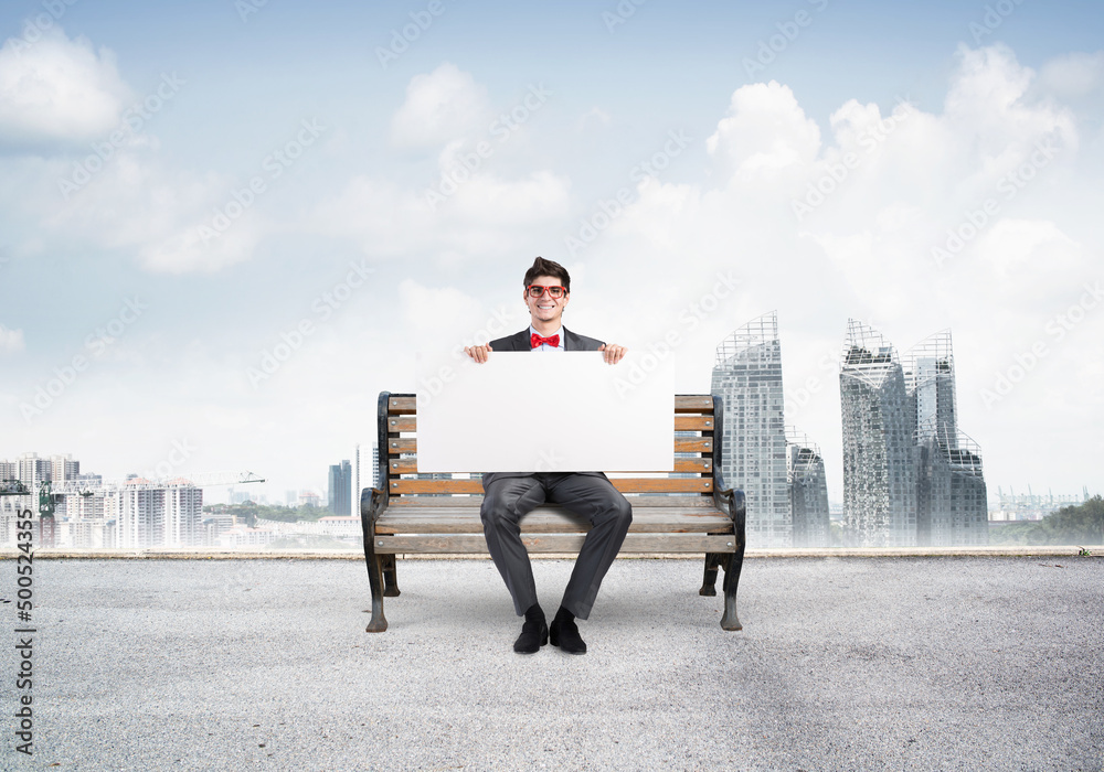 businessman with an empty banner businessman with an empty banner