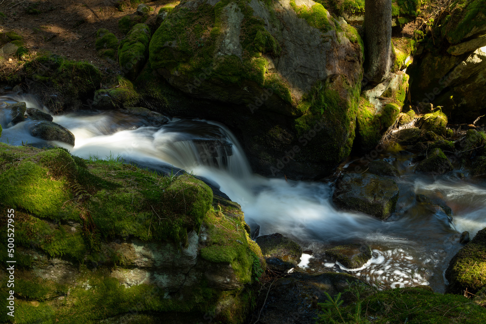 Fototapeta premium The only waterfall on the Czech side of the Bohemian Forest is very modest in height - only 1.5 metres. However, the flow of 350 litres is impressive.