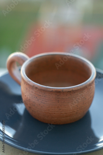      Ceramics, a ceramic product made with your own hands, made on a potter's wheel, a jug, a mug, clay. 