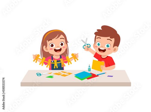 little kid cut paper for art with friend