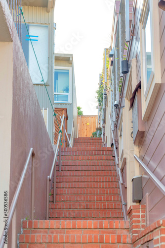 Perron staircase with bricks and metal handrailing at San Francisco, California