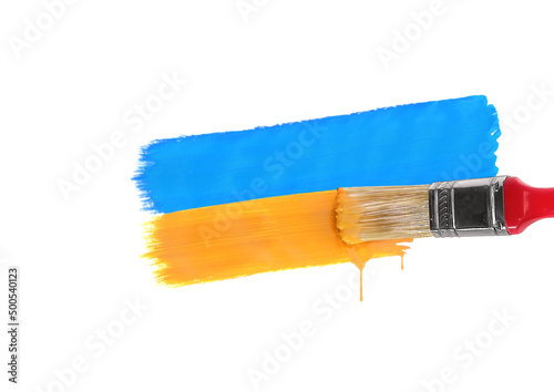 Brush painting the blue and yellow stripes which are the colors of Ukrainian state national flag. Isolated on a white background