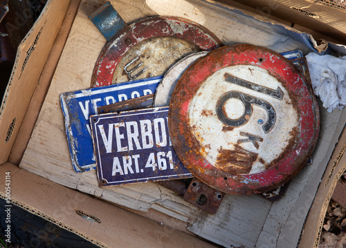 Signs. Verboden toegang. 16 kilometer.  At the junkyard. Perished agricultural history. Abandoned and rusted machinery.



 photo