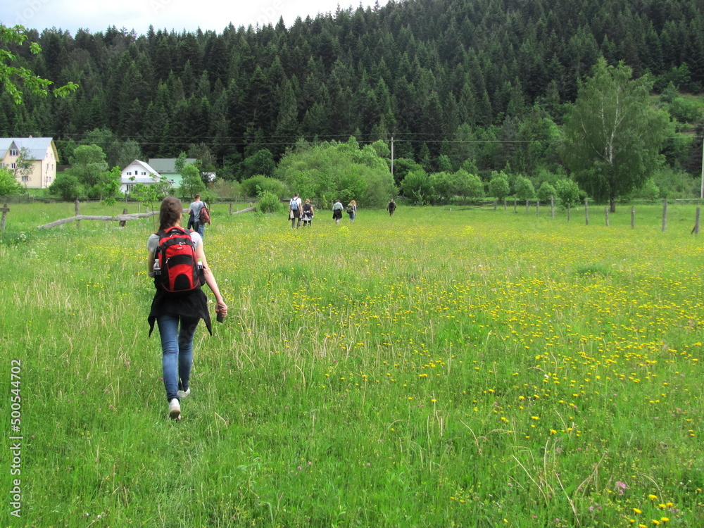 Tourists went hiking in the mountains Tourists went hiking in the mountains