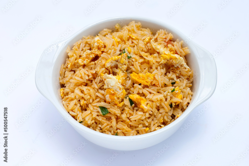 Fried rice in white bowl on white background. Fried rice in white bowl on white background.
