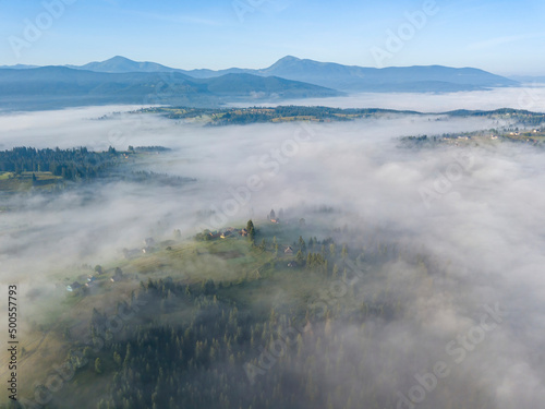 Morning fog in the Ukrainian Carpathians. Aerial drone view.