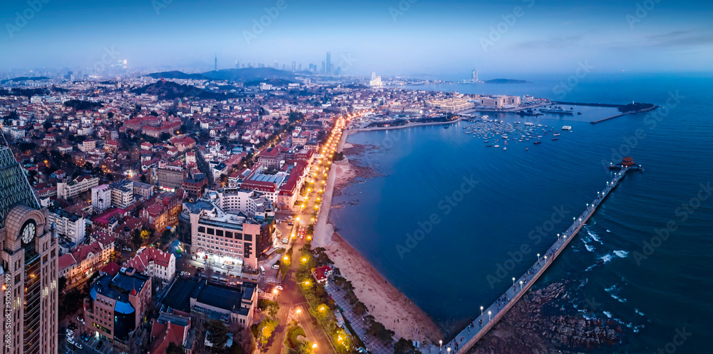 Fototapeta premium Aerial photography of Qingdao coastline bay area night scene large format