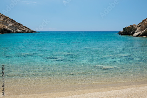 Panoramic view of the stunning turquoise beach of Tripiti in Ios Greece