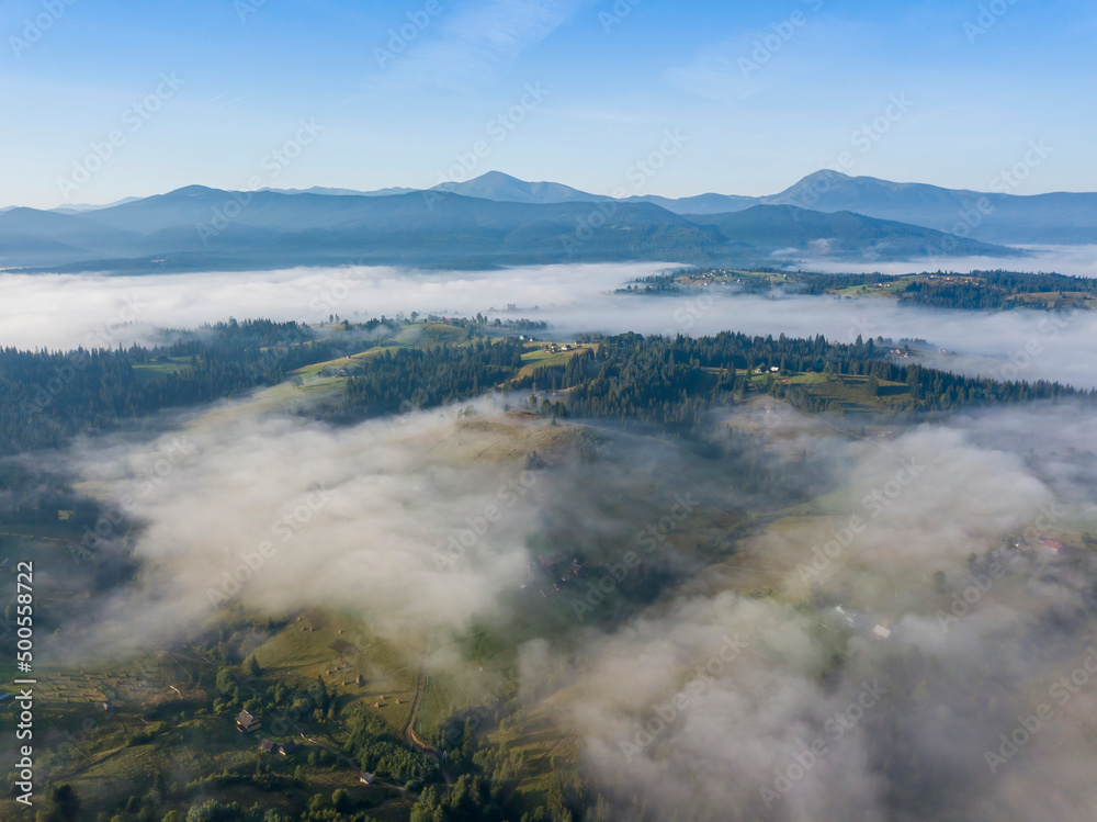 Morning fog in the Ukrainian Carpathians. Aerial drone view. Morning fog in the Ukrainian Carpathians. Aerial drone view.
