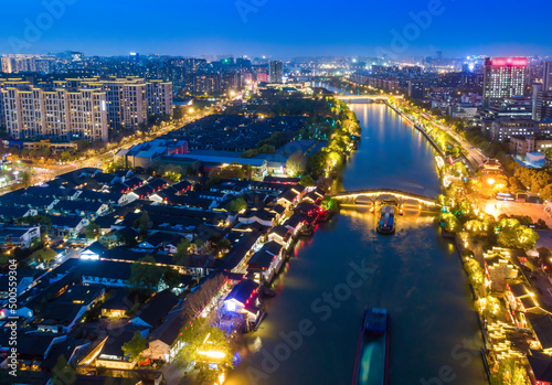 Aerial photography night view of Gongchen Bridge in Tangqi Ancient Town, Hangzhou