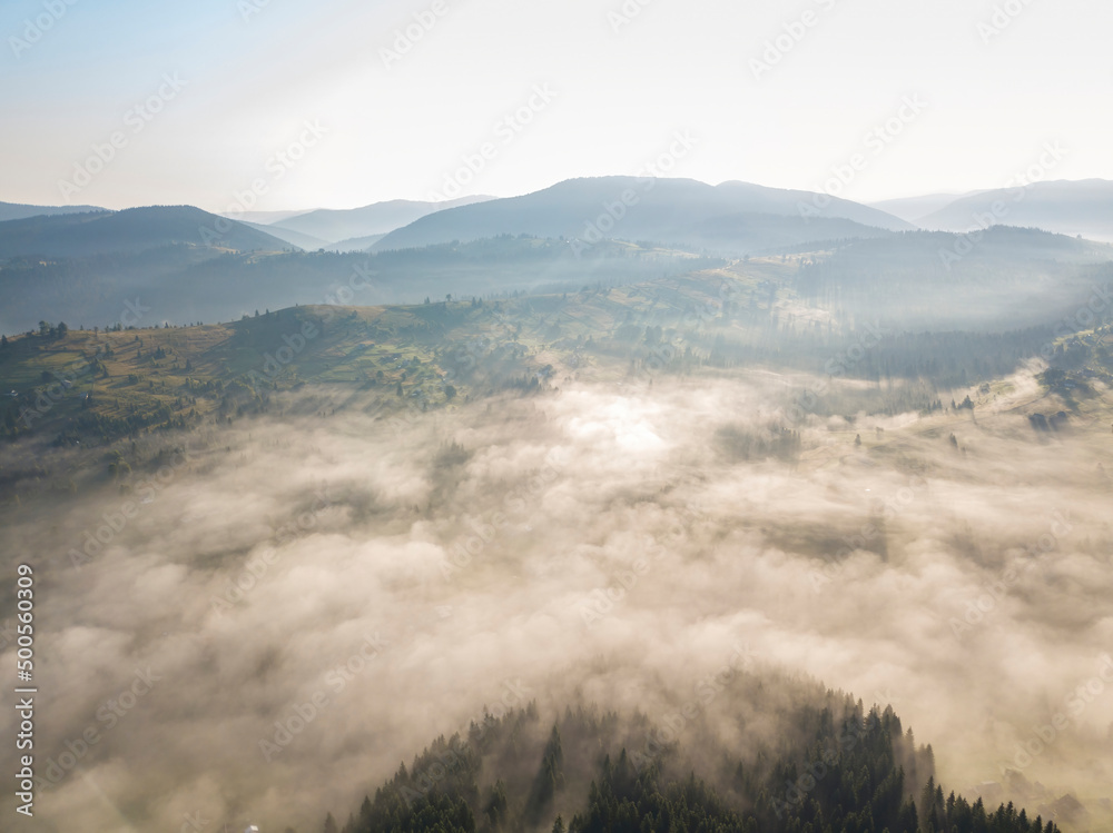 Morning fog in the Ukrainian Carpathians. Aerial drone view. Morning fog in the Ukrainian Carpathians. Aerial drone view.