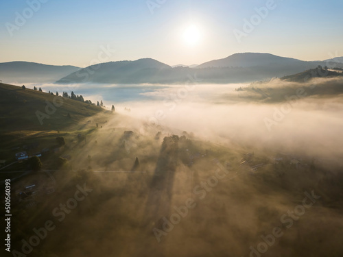 Morning fog in the Ukrainian Carpathians. Aerial drone view.