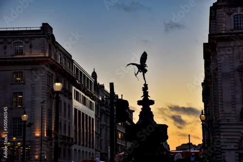 Anteros statue, known as Eros statue. Shaftesbury Memorial Fountain, Piccadilly Circus with sunset  photo