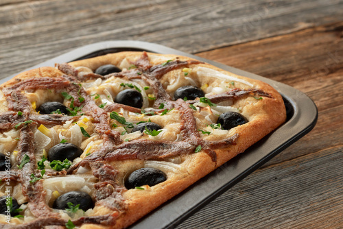 Pissaladière is the famous French onion pie. This onion "pizza" with anchovies and olives comes from Nice and can be made with bread or cooked dough.